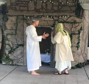 An angel greets Mary at Jesus' empty tomb.