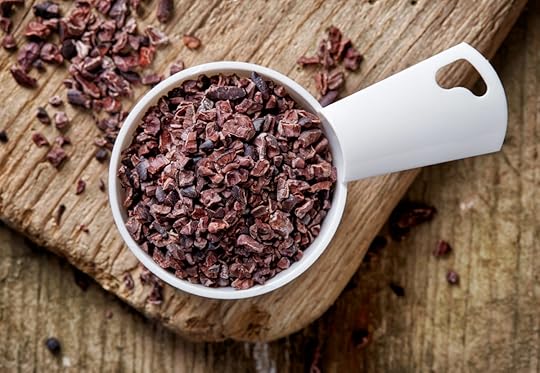 measuring cup with cacao nibs