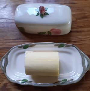 solid slab of butter on butter dish