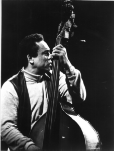 Portrait of Charles Mingus with double bass.