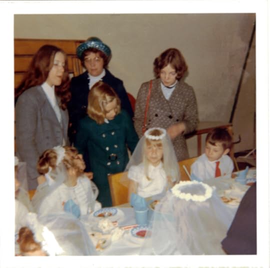 Colour photo of people oi 70s clothes attending a first holy communion