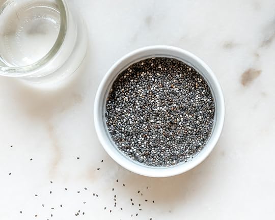Bowl of Activated Chia seeds and a glass of water