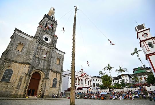 Flying dancers performing the Dance of the Flyers ritual, Puebla Mexico