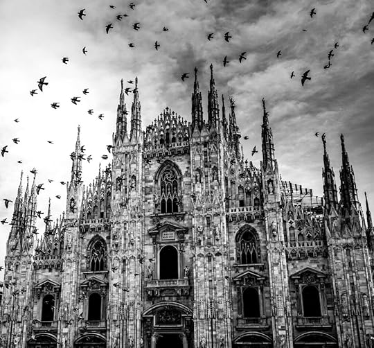Old cathedral with bats flying overhead