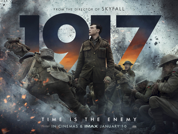 Film Poster of 1917. A British soldier standing in the middle of other British soldiers who are huddled in trenches trying to survive with debris exploding all around them and the numbers 1917 emblazoned in the background with gray and orange coloring.