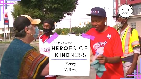 woman giving food to homeless