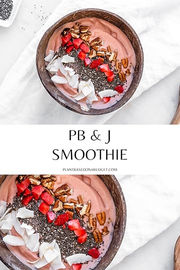 Coconut Bowl filled with PB&J smoothie and various toppings