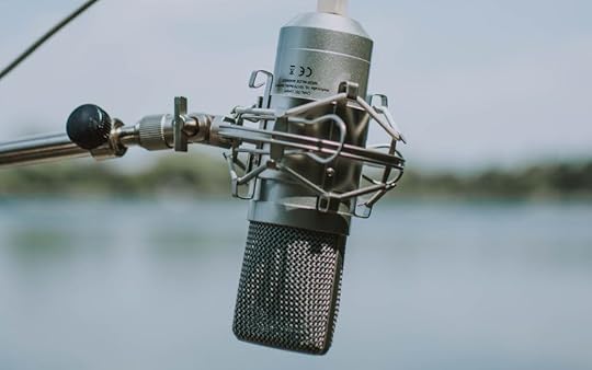 Photo of a podcasting microphone in nature