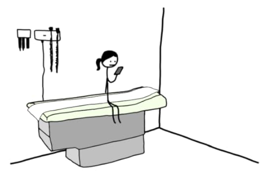 Tandice sitting in a doctor's office, looking at her cell phone