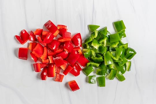 Chopped Red and Green Bell Pepper on a Marble Surface