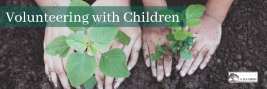 Parent's and child's hands planting trees in the dirt with text reading 'volunteering with children'.