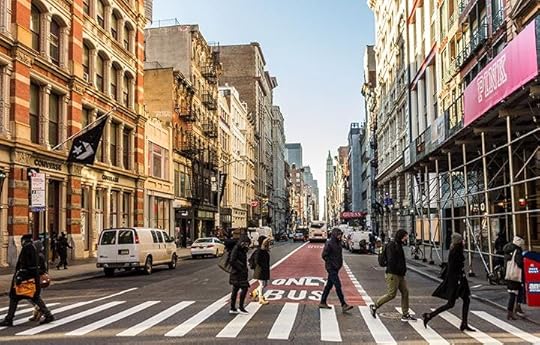 People crossing a streetDescription automatically generated with medium confidence