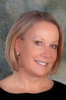 Headshot of L.A. Sartor on release day of Brushed By Betrayl