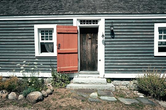 An open red door in Lunenburg, Nova Scotia