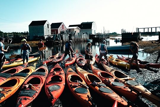 A row of kayaks at Blue Rocks