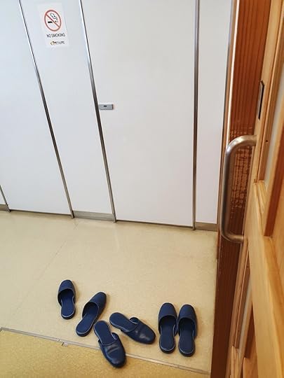 Slippers inside a hotel bathroom in Japan
