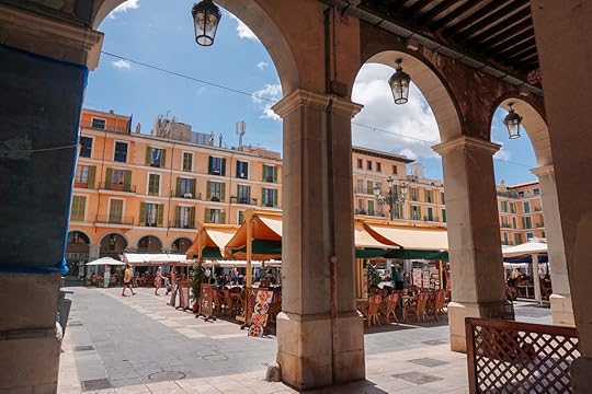 View between arches of Plaza Mayor in Palma de Mallorca