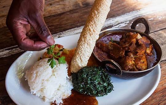local favorite dish pata pata served with rice, Maboneng district Johannesburg