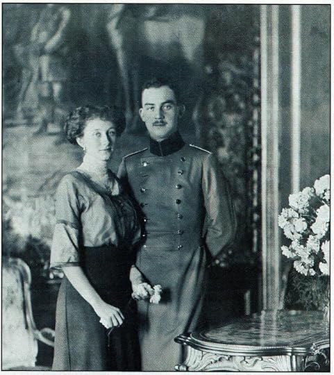 Black and white photo of the princess and prince standing close beside each other.