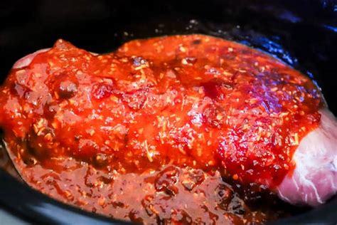 Place the pork loin in your crockpot and cover with the cranberry mixture. Slow Cooker Cranberry Pork Loin • The Diary of a Real ...