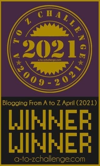 A-Z challenge 2021 winners badge. Purple with gold logo.