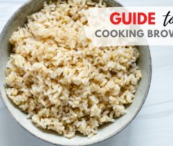 Bowl of Cooked Brown Rice with Text: Guide to Cooking Brown Rice