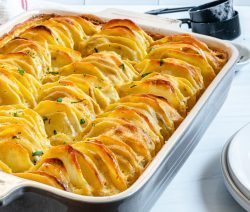 Baking Dish with some Cooked Scalloped Potatoes