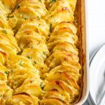Baking Dish with some Cooked Scalloped Potatoes
