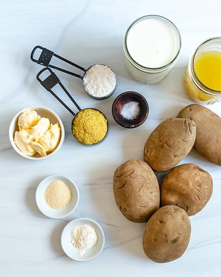 Scalloped Potatoes Ingredients on a marble surface