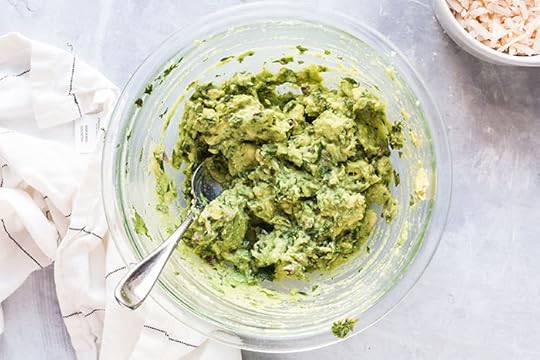 guacamole in a mixing bowl for cheddar stuffed burger with avocado with a lettuce wrap recipe