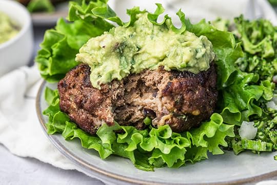 cheddar stuffed burger with avocado with a lettuce wrap