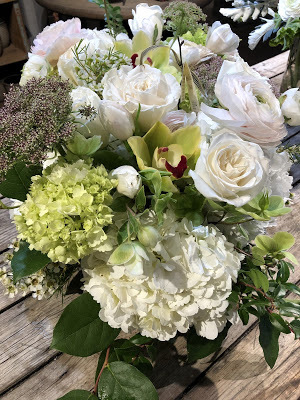 white hydrangea, orchid, roses