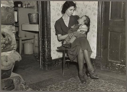 Depression era woman holding a toddler in her lap