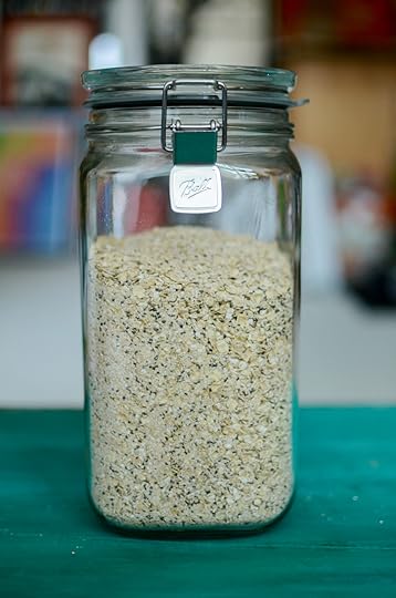 A large Ball Storage Latch Jar filled with homemade instant oats.