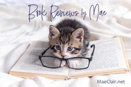 Cute striped kitten with open book and eyeglasses lying on white bed