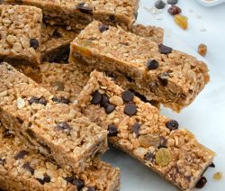 Homemade Granola BArs Liad out on a marble white surface