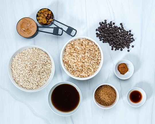 Ingredients of Chewy Gluten-Free Peanut Butter Granola Bars Laid out on a Marble White Surface