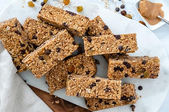 Homemade Granola BArs Liad out on a marble white surface