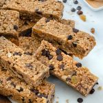 Homemade Granola BArs Liad out on a marble white surface