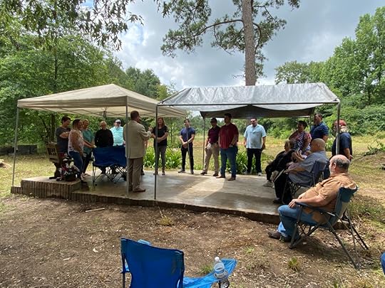 This is the slab. There are more behind us you can't see. The blue chair is where my bedroom was.