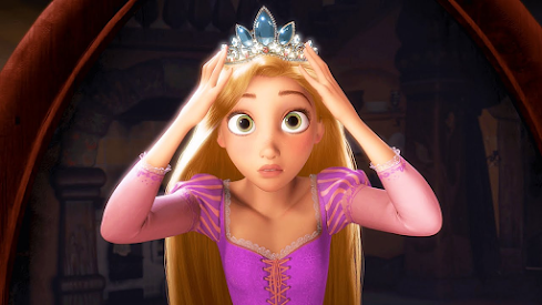 Rapunzel tries on her tiara for the first time