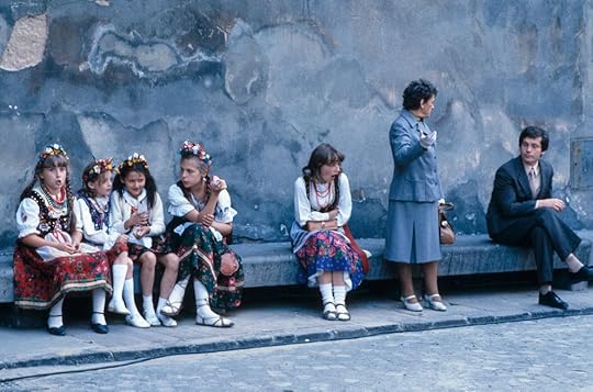 Five Polish school girls, in regional costumes, waiting next to a wall with two well-dressed adults. awaiting Pope John Paul's procession in Katowice, Poland., waiting for Pope