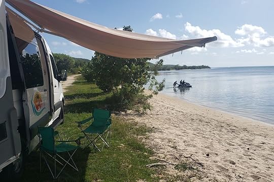 isla-van-parked-on-beach-discover-puerto-rico,Puerto Rico by van