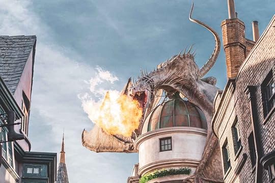 picture of fire-breathing dragon on top of a building