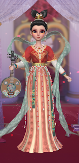Red beaded dress with musical instrument accessory and hair that resembles a mermaid tail