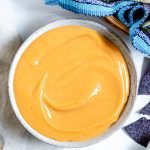 cheese in white bowl with white background