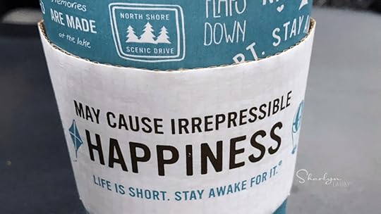 coffee cup saying wellbeing may cause irrepressible happiness