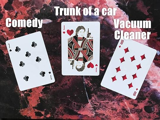 Flash Fiction Draw for July 2021: Three playing cards are shown, a 7 of clubs, a Jack of hearts, and a 10 of diamonds, with the words 