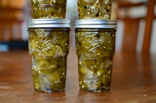 Four Ball® Nesting Pint Jars, stacked two by two, filled with the finished Maple Pickled Jalapeños.