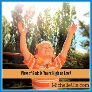 Boy raising his arms to express his view of God
